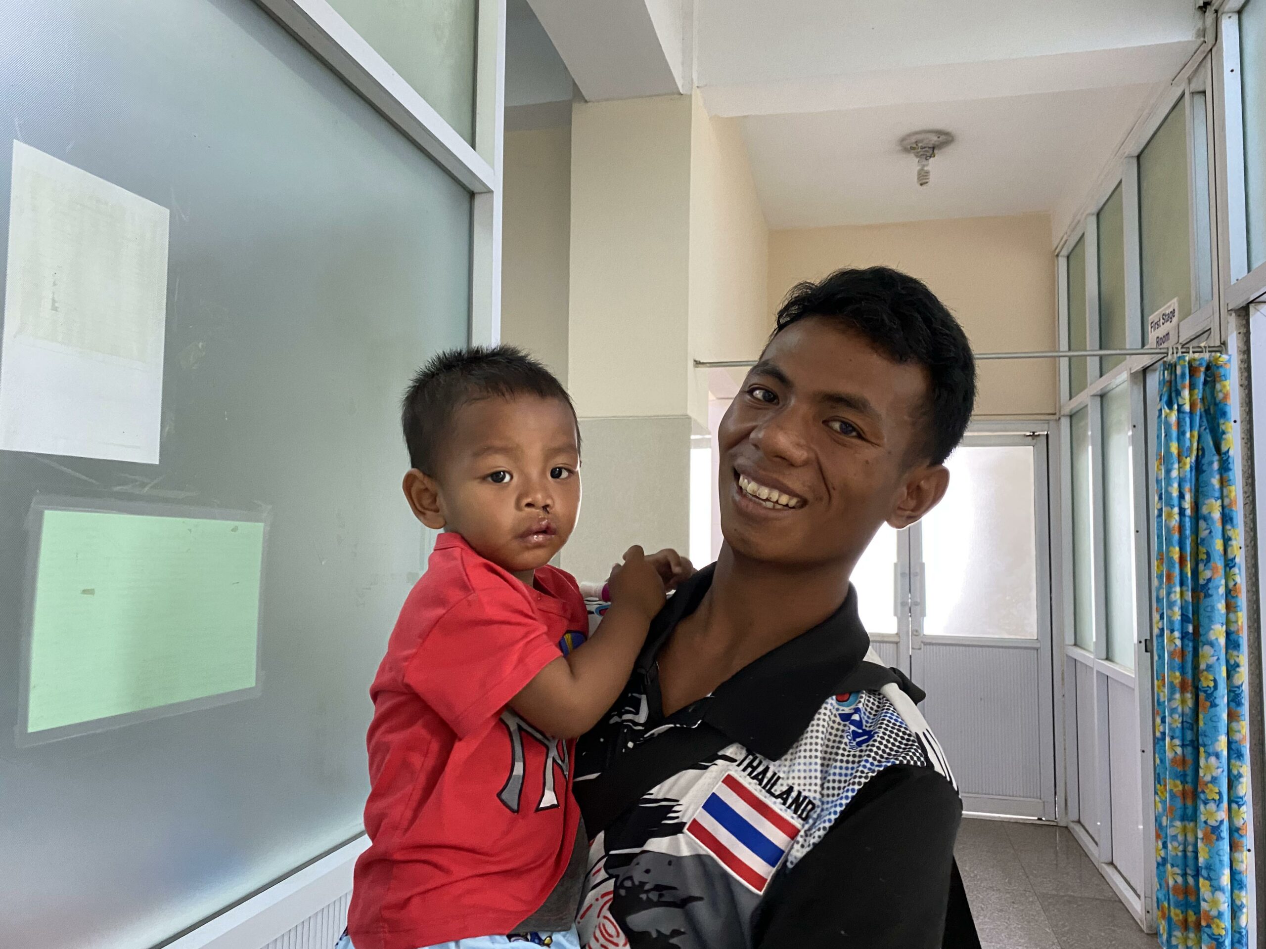 Myanmar-Father-Cleft_Transforming-Faces A father cares for his son after his surgery